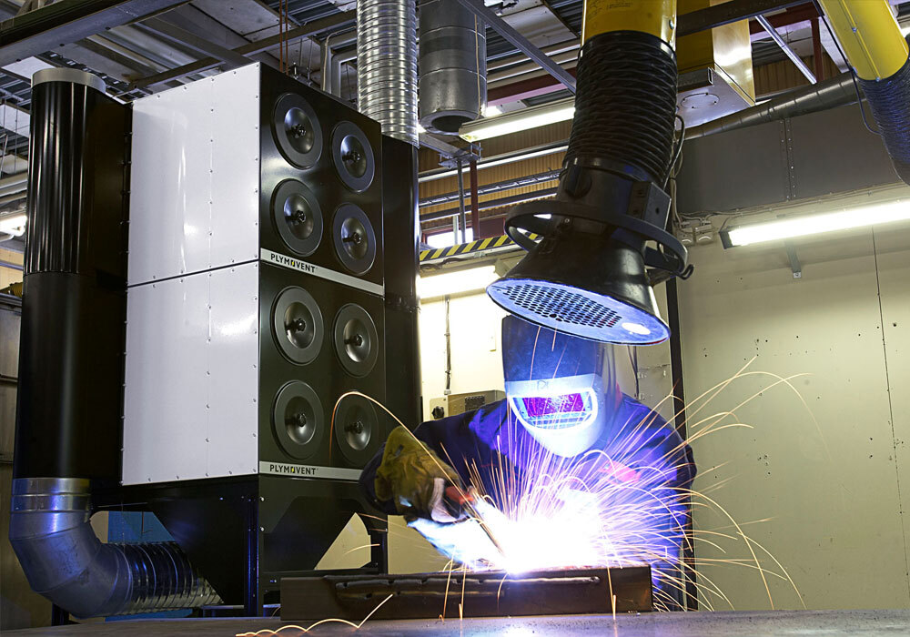 Man Welding With LEV System