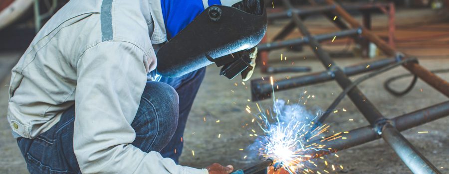 man welding